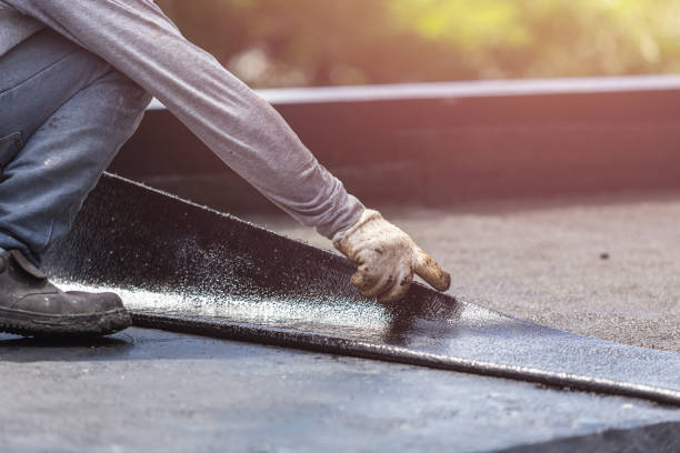 Professional Basement Waterproofing technician working in Clinton, WA